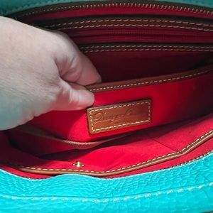 Dooney and Bourke purse never used . Brand new .